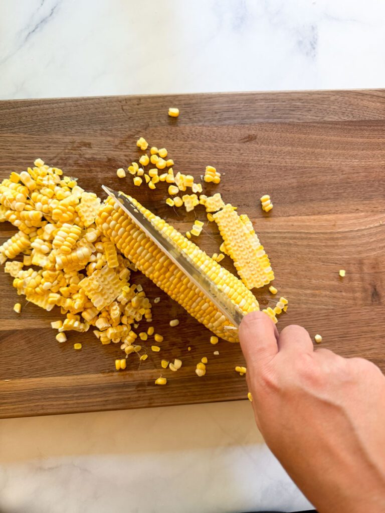 Cutting corn off the cob
