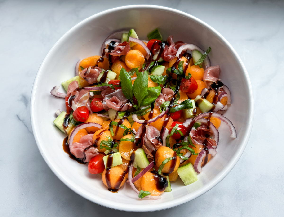 Cantaloupe Prosciutto Salad arranged in serving dish
