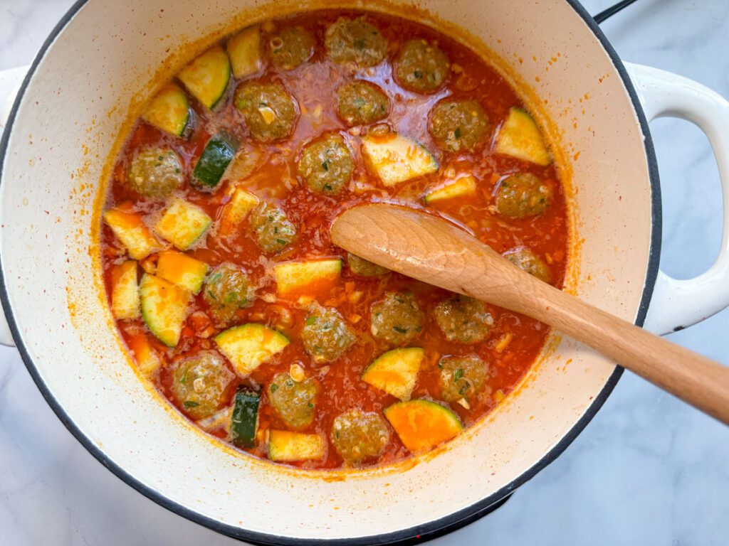 Thai Red Curry Meatball Soup simmering in pot