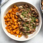 philly cheesesteak and potato view in a bowl shot from overhead